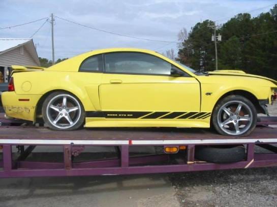99-04 Ford Mustang Coupe Manual - Yellow
