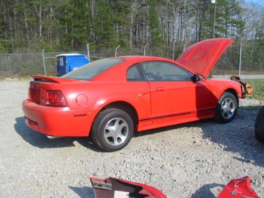 99-04 Ford Mustang Coupe 3.8 Manual
 - Red - Image 1