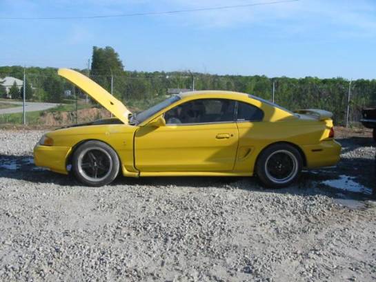 94-98 Ford Mustang Coupe 4.6 Manual - Yellow - Image 1