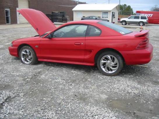 94-98 Ford Mustang Coupe 5 Automatic - Red - Image 1