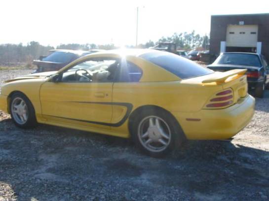 94-98 Ford Mustang Coupe 5 Manual - Yellow - Image 1
