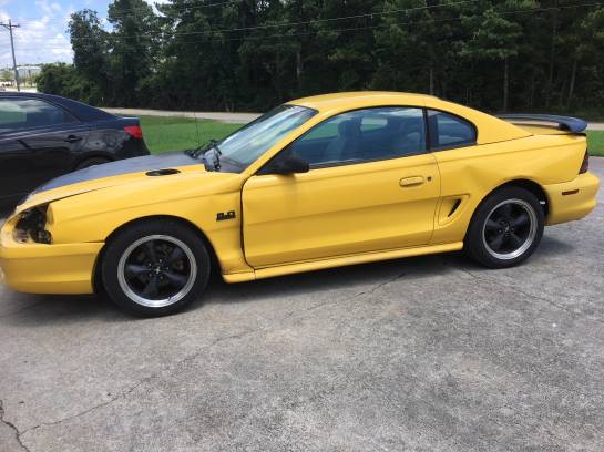 1994 Ford Mustang GT Auto - Yellow - Image 1
